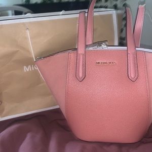 Brand new! A dog chewed the straps before I could use it. It is fixable!